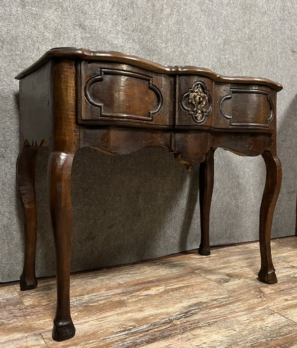 Lyonnaise game console from the Louis XV period with crossbow facade circa 1750