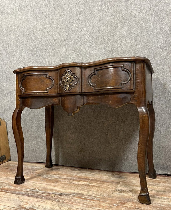 Lyonnaise game console from the Louis XV period with crossbow facade circa 1750