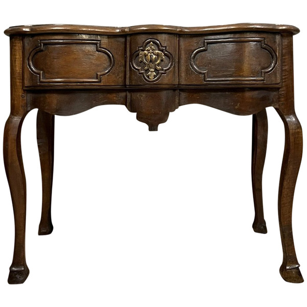Lyonnaise game console from the Louis XV period with crossbow facade circa 1750