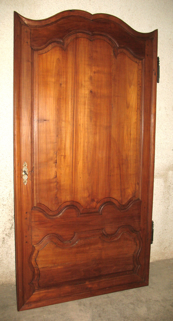 Porta in legno modanato in stile Luigi XIV in ciliegio, fine XVIII secolo 