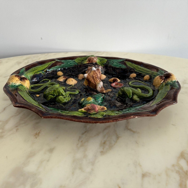 Barbotine dish decorated with shells and Palissy lizard