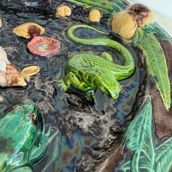 Barbotine dish decorated with shells and Palissy lizard