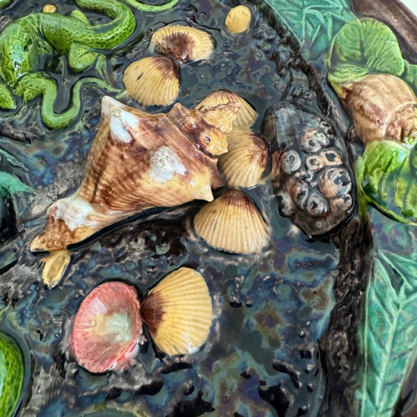 Barbotine dish decorated with shells and Palissy lizard
