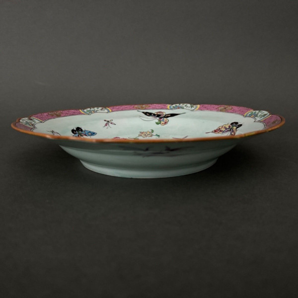 China plate with 19th century signature decorated with butterflies and vegetation