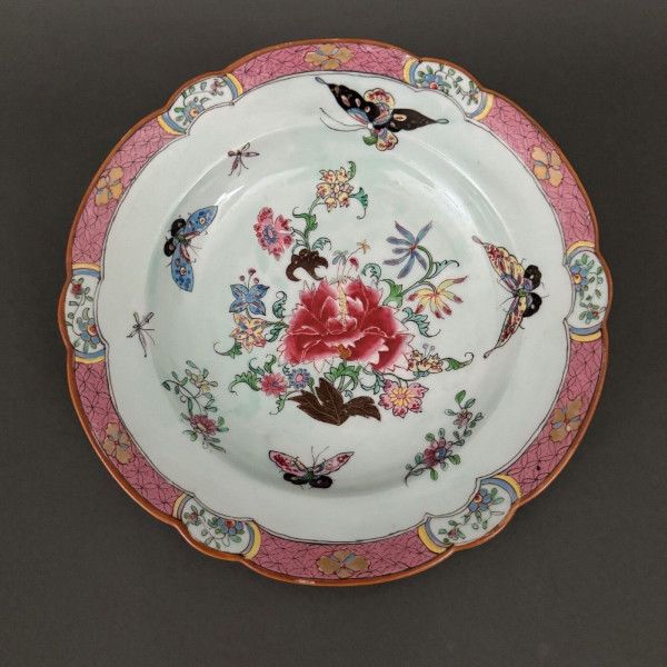 China plate with 19th century signature decorated with butterflies and vegetation