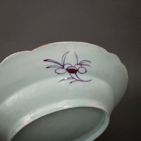 China plate with 19th century signature decorated with butterflies and vegetation