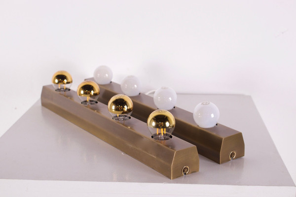 “Vanity lamp” dressing room wall lights, bronze finish.