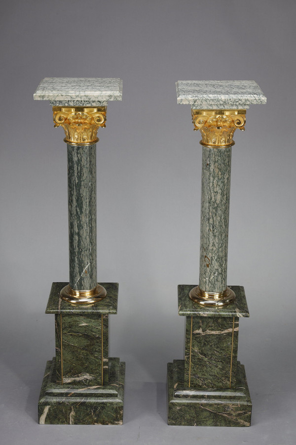 Pair of green Estours marble columns with Corinthian capitals