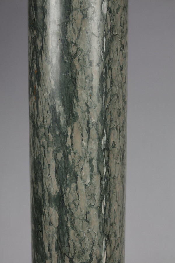 Pair of green Estours marble columns with Corinthian capitals