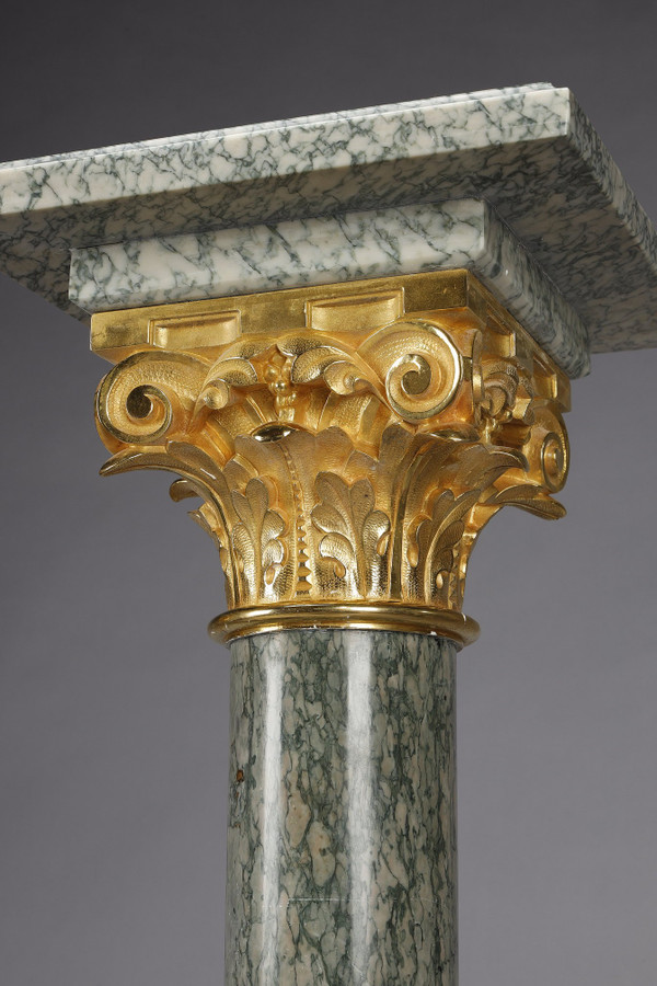 Pair of green Estours marble columns with Corinthian capitals