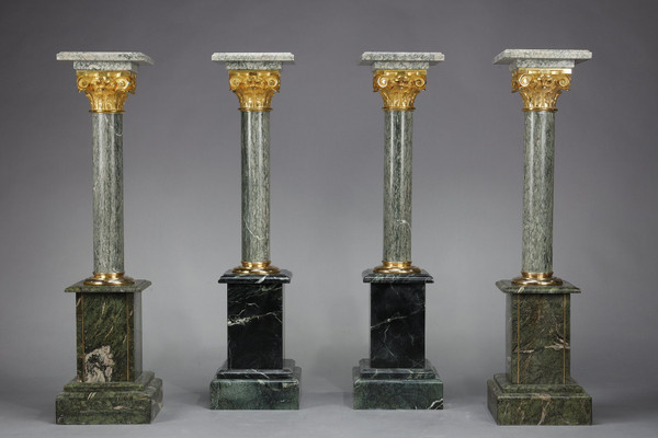 Pair of green Estours marble columns with Corinthian capitals