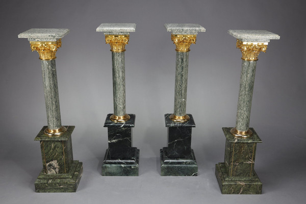 Pair of green Estours marble columns with Corinthian capitals