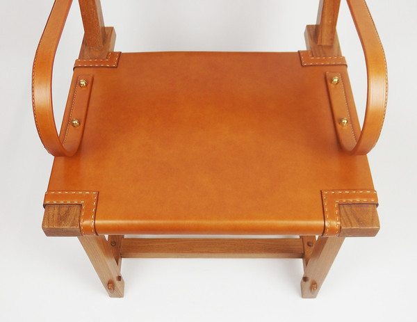 Poltrona in pelle di Jacques Adnet