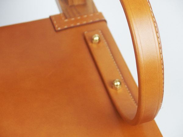 Poltrona in pelle di Jacques Adnet