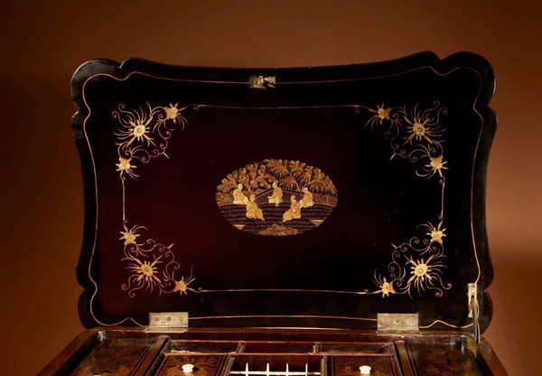 An original lacquered sewing/working table, still with the original Chinese gold paint.