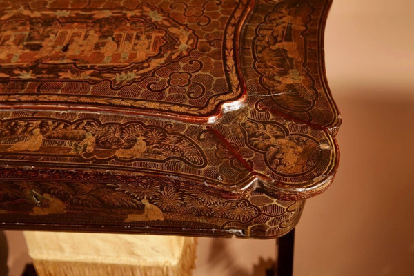 An original lacquered sewing/working table, still with the original Chinese gold paint.