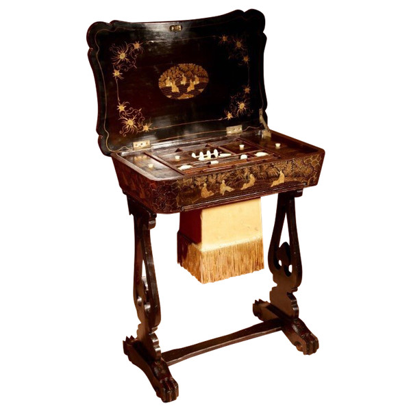 An original lacquered sewing/working table, still with the original Chinese gold paint.