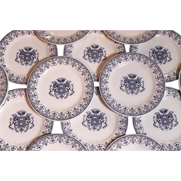 22 Gien earthenware dessert plates with Rouen coat of arms decor. 20th century Perfect condition