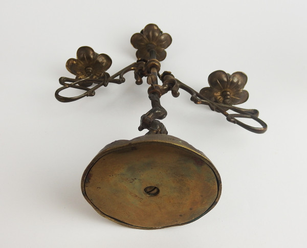 Pair of Art Nouveau bronze candlesticks.