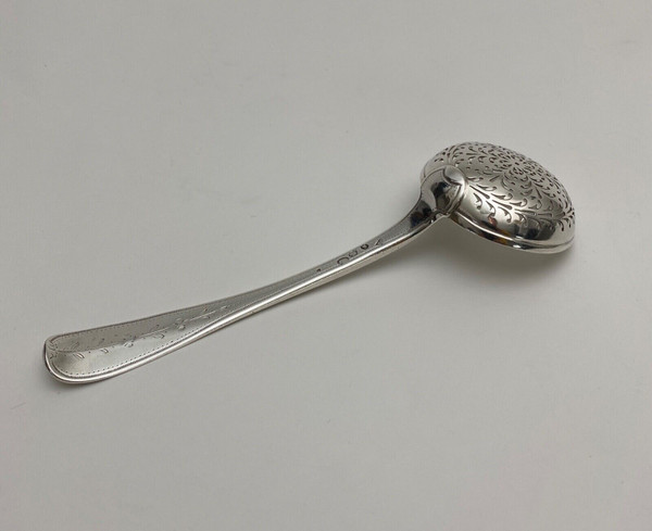 18th century silver sprinkling spoon from the Farmers General