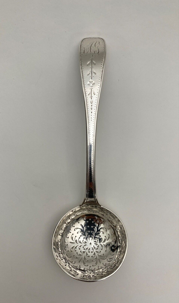 18th century silver sprinkling spoon from the Farmers General