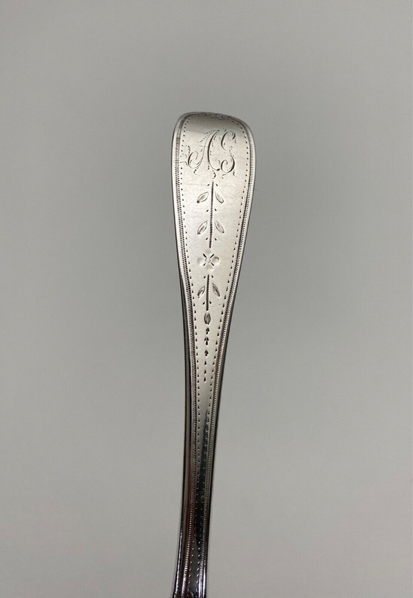 18th century silver sprinkling spoon from the Farmers General