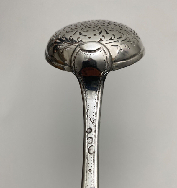 18th century silver sprinkling spoon from the Farmers General