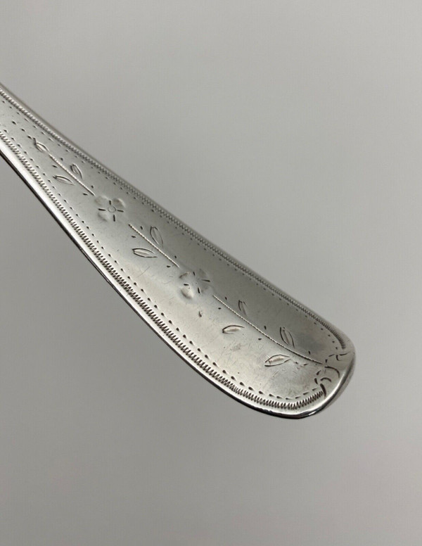 18th century silver sprinkling spoon from the Farmers General