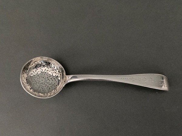 18th century silver sprinkling spoon from the Farmers General