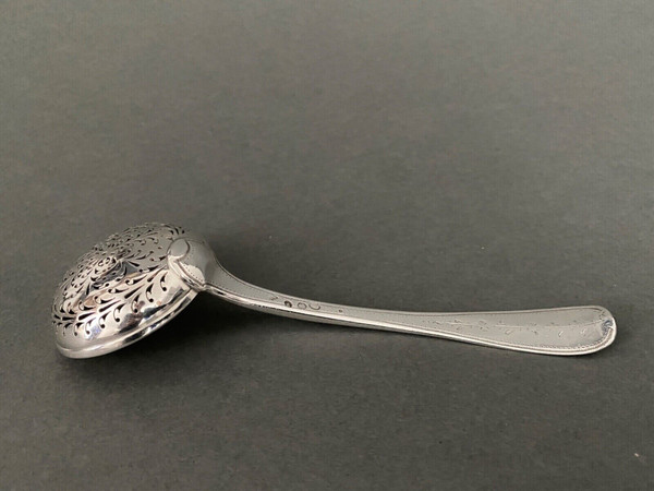 18th century silver sprinkling spoon from the Farmers General