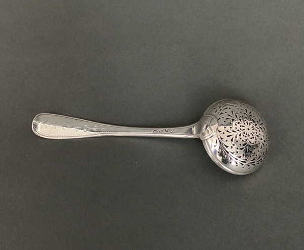 18th century silver sprinkling spoon from the Farmers General