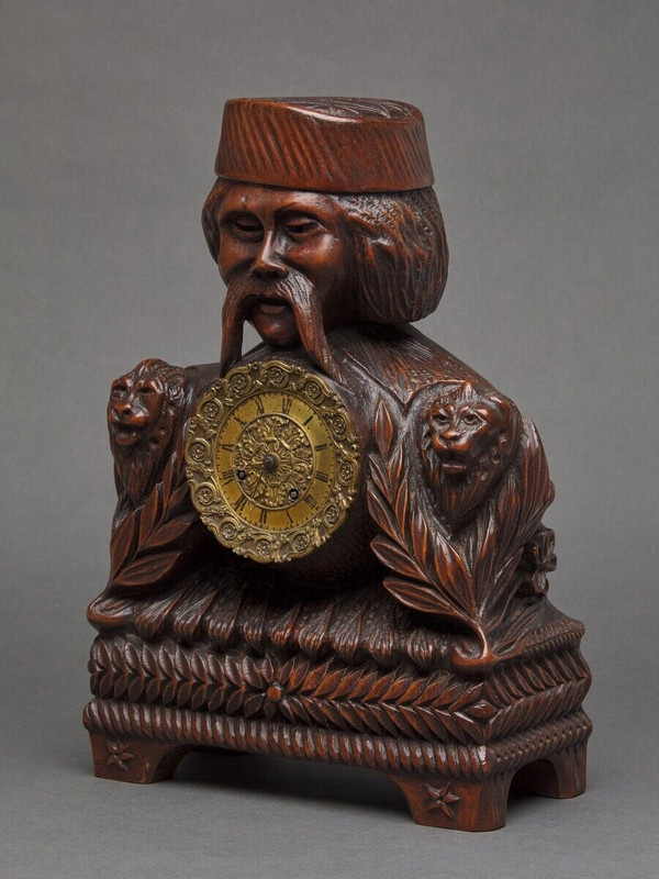 Richly ornamented carved wooden clock 19th century Chinese sage