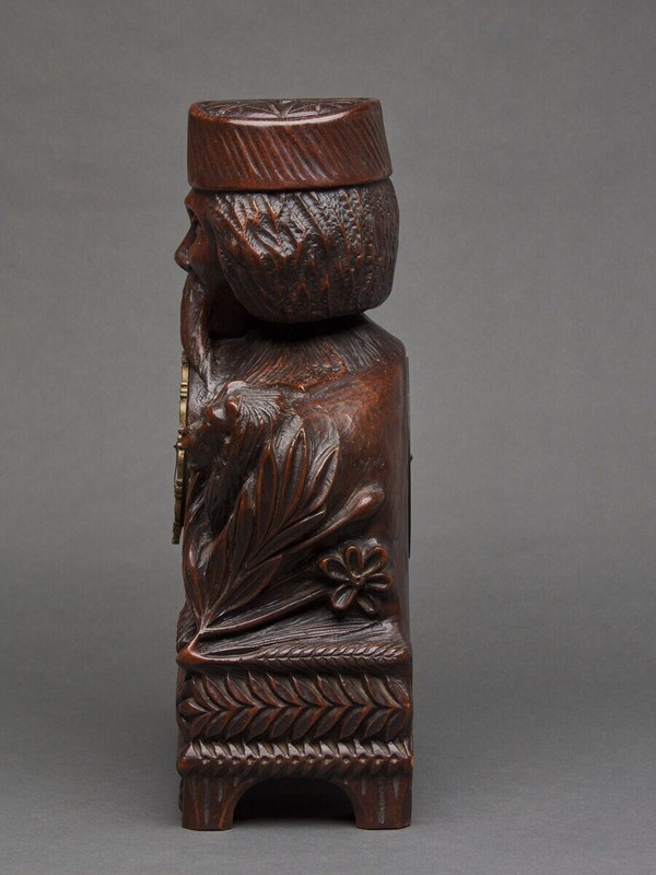 Richly ornamented carved wooden clock 19th century Chinese sage