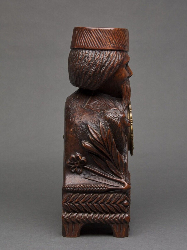 Richly ornamented carved wooden clock 19th century Chinese sage