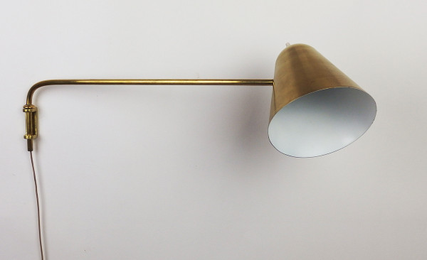 brass wall light by Jacques Biny for Luminalite