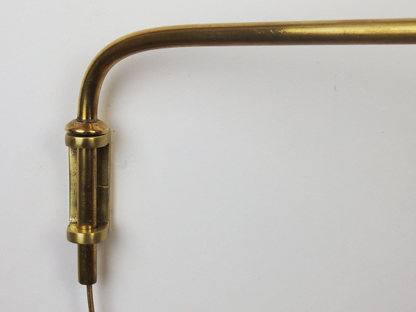 brass wall light by Jacques Biny for Luminalite