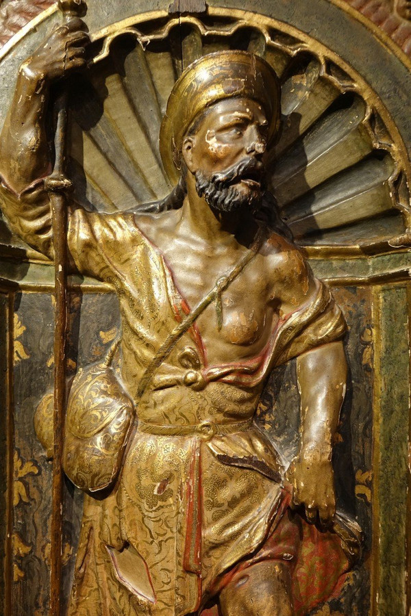 Half-relief in gilded and polychromed wood, representing Saint Roch. Spain, 16th century.