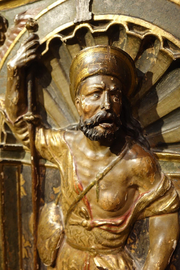 Half-relief in gilded and polychromed wood, representing Saint Roch. Spain, 16th century.