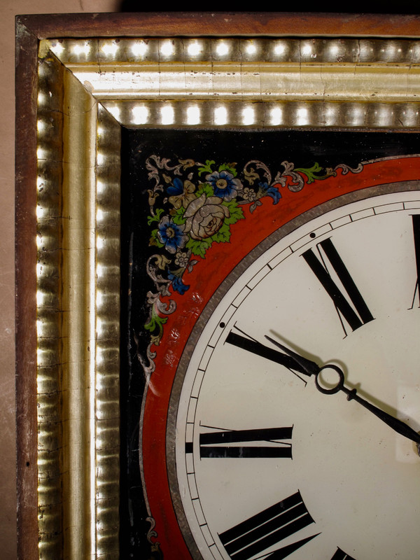 A highly decorative original reverse painted glass (Verre Eglomise) dial wall clock from the
