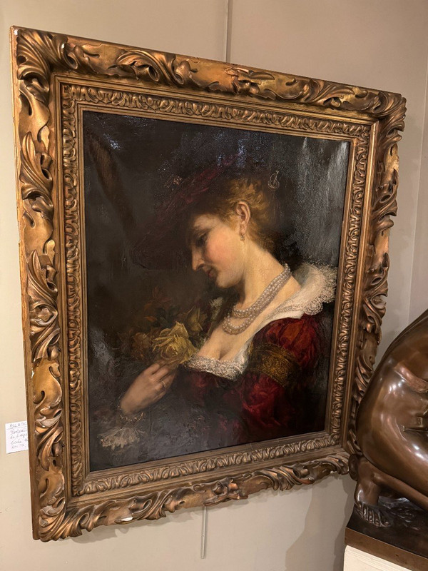 Portrait d'une jeune femme tenant un bouquet de roses. A.BRASCH 1901