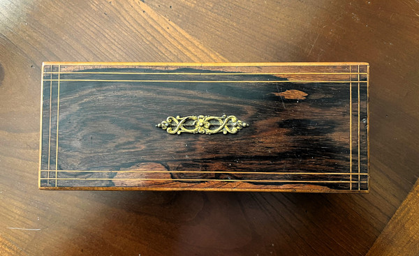 Rosewood box, or glove box from the 19th century.