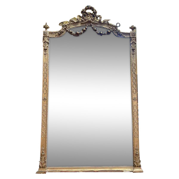 Miroir de style Louis XVI en bois doré