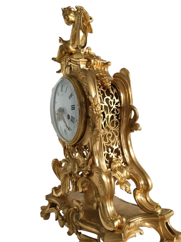 Orologio in bronzo dorato, XIX periodo di transizione Luigi XV/XVI