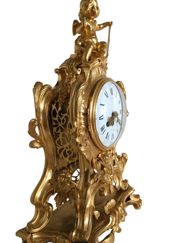 Orologio in bronzo dorato, XIX periodo di transizione Luigi XV/XVI