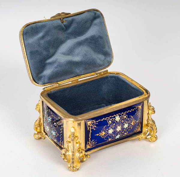 A box of enamel and gilded bronze jewelry, late 19th century