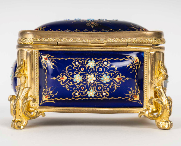 A box of enamel and gilded bronze jewelry, late 19th century
