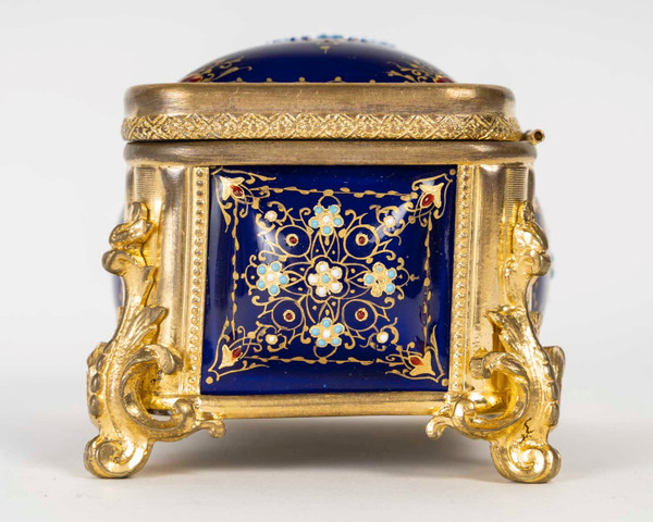 A box of enamel and gilded bronze jewelry, late 19th century