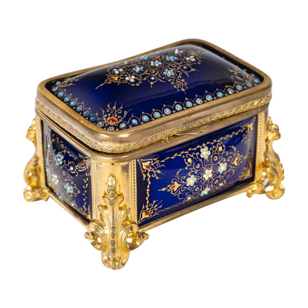 A box of enamel and gilded bronze jewelry, late 19th century