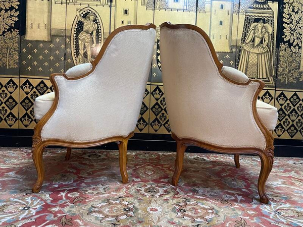 Paire de fauteuils bergères gondoles de style Louis XV