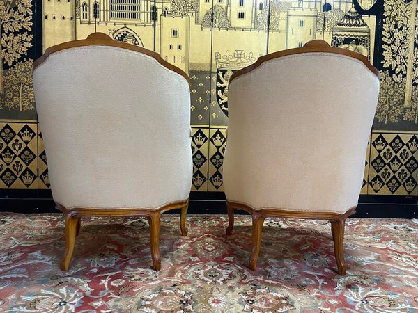 Paire de fauteuils bergères gondoles de style Louis XV